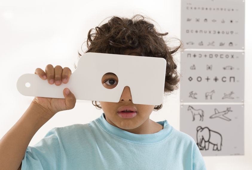 Pediatric Eye Care: Young Boy having his eyes checked